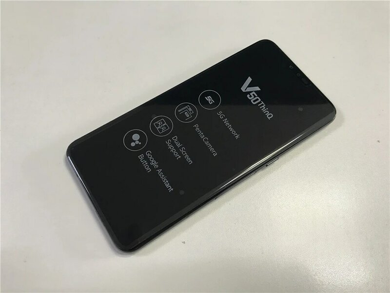 هاتف LG V50 ThinQ الأصلي V500N بشاشة 6.4 بوصة وذاكرة وصول عشوائي 6 جيجابايت وذاكرة قراءة فقط 128 جيجابايت وكاميرا خلفية ثلاثية بدقة 16 ميجابكسل هاتف LTE بشريحة واحدة وخاصية إلغاء التأمين ببصمة الإصبع