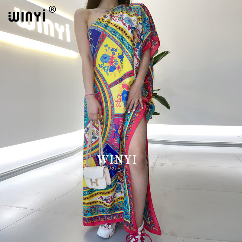 2021 WINYI فستان نسائي مطبوع تصميم موضة كتف قطري فستان فضفاض ماكسي فستان طويل فستان صيف أنيق لحفلات الشاطئ