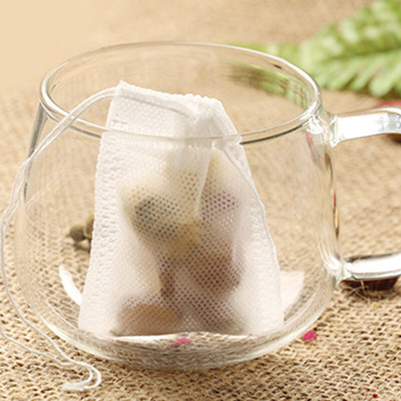 100 قطعة الغذاء الصف أكياس الشاي المعطرة فارغة إينفوسير مع سلسلة شفاء ختم ورق فلتر للشاي عشب فضفاض