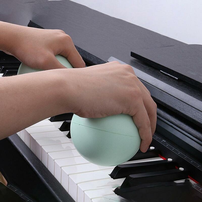 البيانو قبضة الكرة آمنة صغيرة قابلة لإعادة الاستخدام قبضة التدريب فنجر المرونة المتمرن لممارسة فنجر الكرة فنجر قطار الكرة