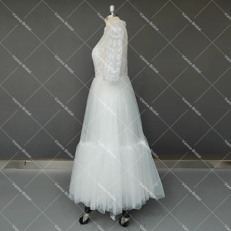 الشاي طول الدانتيل فستان الزفاف نصف الأكمام مخصص بدوره إلى أسفل طوق انظر من خلال الوهم تول الخامس الرقبة زي العرائس