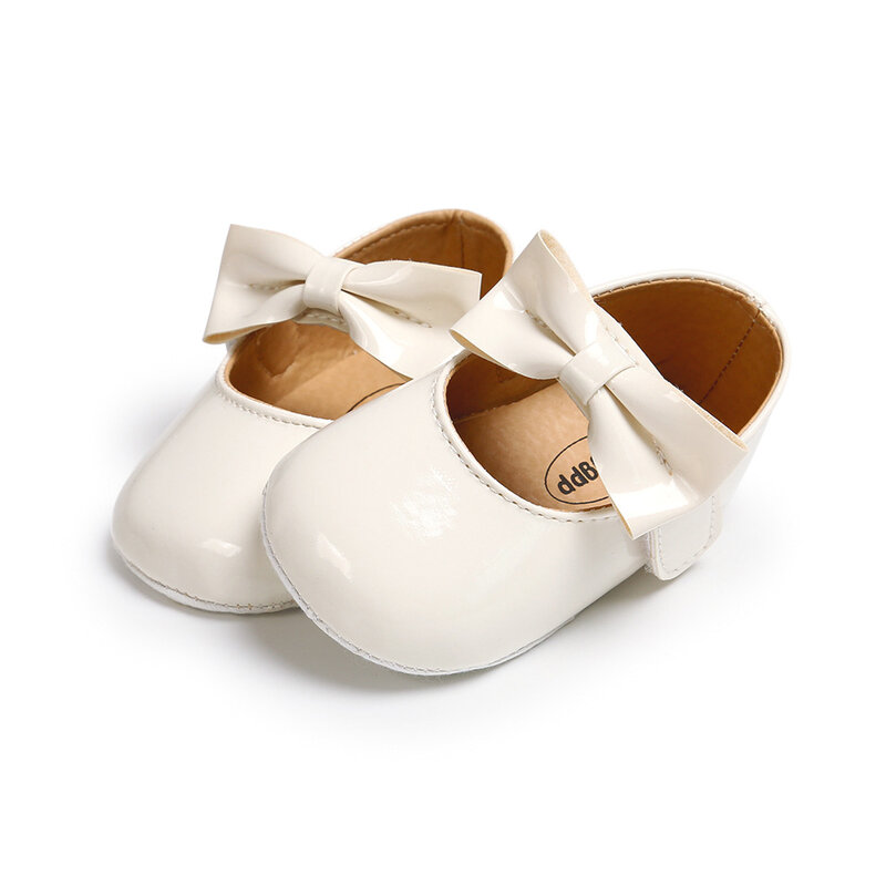 أحذية الأطفال حديثي الولادة أحذية الفتيات أحذية بو المضادة للانزلاق Bowknot الكلاسيكية فستان الأميرة أحذية الأولى ووكر طفل سرير حذاء الأخفاف