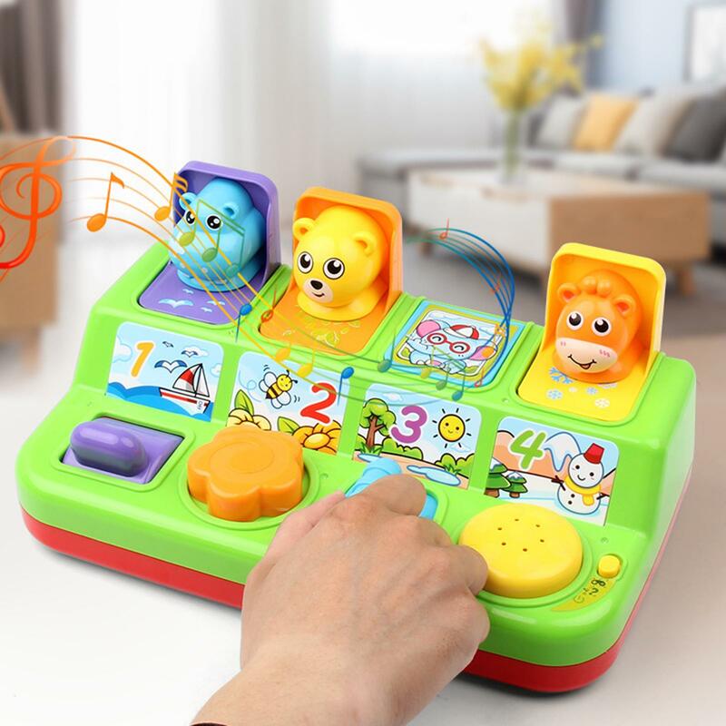لعبة تفاعلية منبثقة على شكل حيوان كرتوني لطيف مع موسيقى هدية للأطفال ذاكرة تدريب للأطفال الصغار لعبة ألغاز تطوير