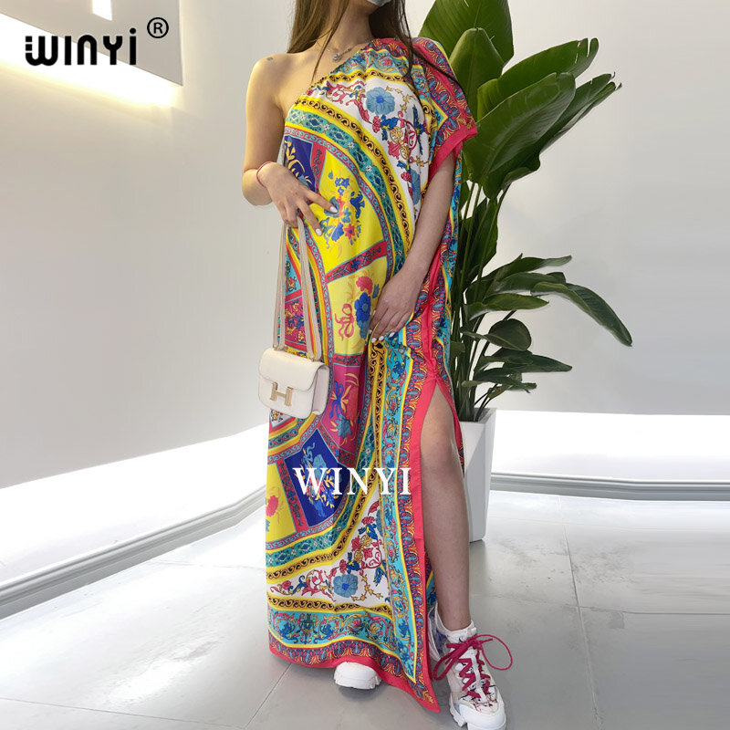 2021 WINYI فستان نسائي مطبوع تصميم موضة كتف قطري فستان فضفاض ماكسي فستان طويل فستان صيف أنيق لحفلات الشاطئ