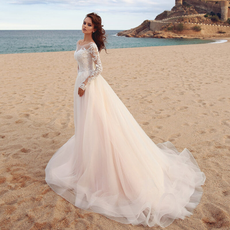 فستان زفاف الشاطئ من TIXLEAR Charmig للنساء بوهو 2023 بأكمام طويلة على شكل حرف a رقبة سكوب سويب تراين تول دانتيل فساتين العروس