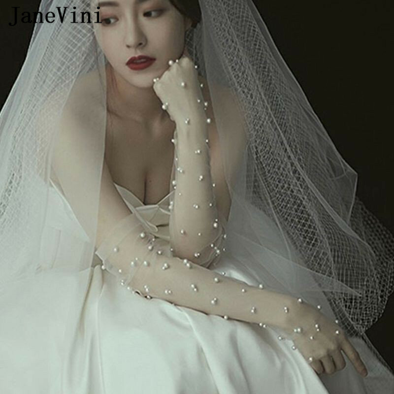 JaneVini-قفازات زفاف طويلة أنيقة للنساء ، تول شفاف ، أميرة ، لؤلؤ ، بدون أصابع ، فستان زفاف ، أبيض ، إكسسوارات ، 2019