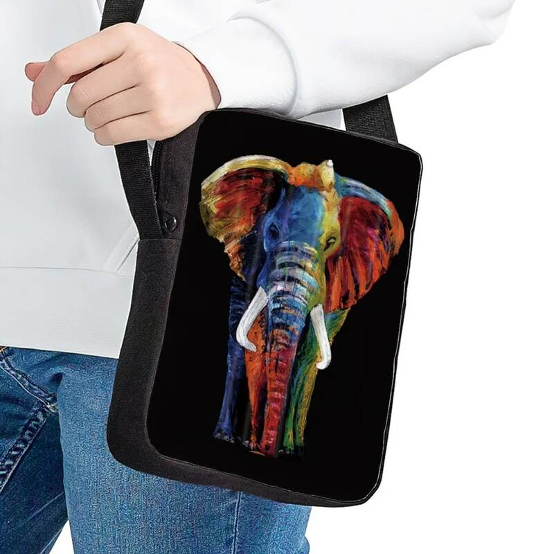 حقيبة كروسبودي من Jackherelook للأطفال مُزينة بطباعة على شكل فيل ملون حقيبة سفر أنيقة للأطفال حقيبة ساعي البريد حقيبة كتف للأولاد والبنات