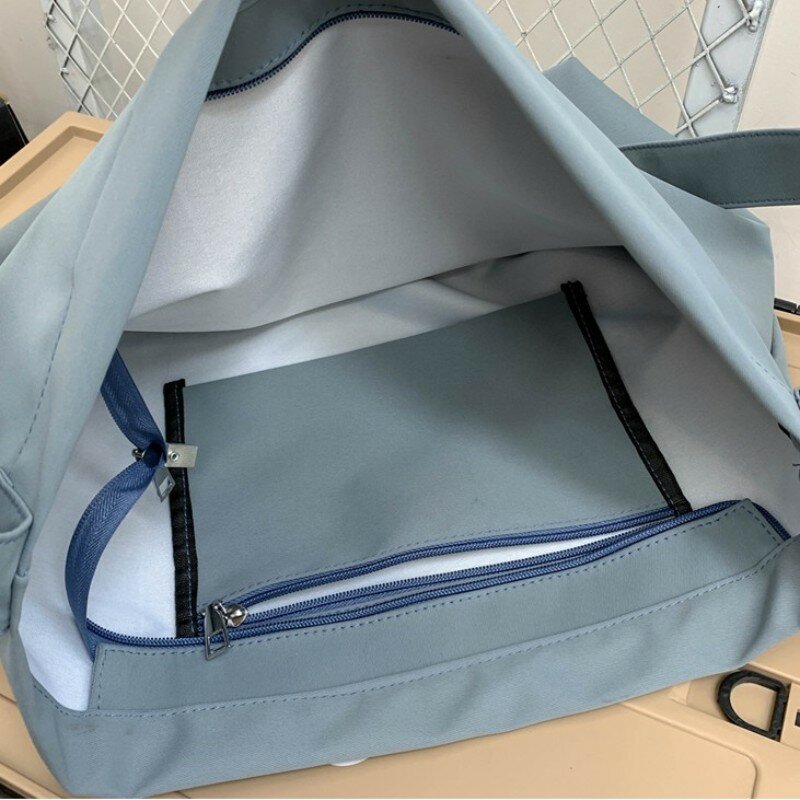 2023 الرجال والنساء سعة كبيرة رسول حقيبة كروسبودي حقيبة الطالب حقيبة عالية الجودة قماش السفر في الهواء الطلق اللياقة البدنية حقيبة