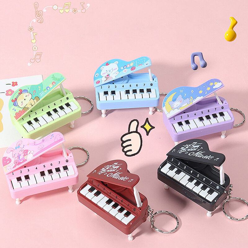سلاسل مفاتيح موسيقية كرتونية مبتكرة ، قلادة بيانو آلة موسيقية صغيرة ، حلقة مفاتيح إلكترونية
