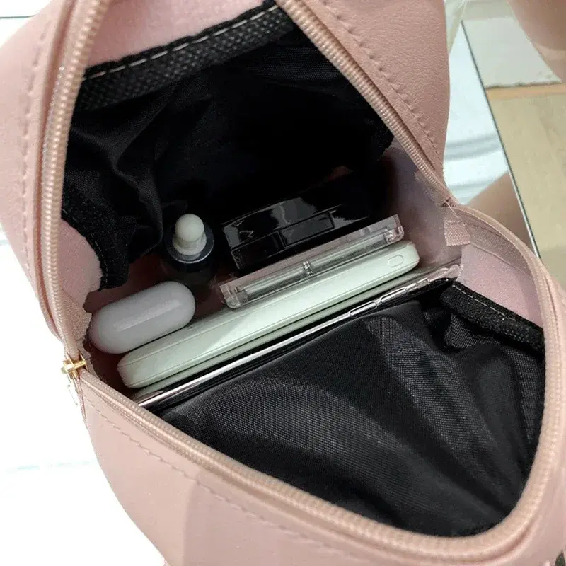حقيبة ظهر صغيرة من Youda Pu بلون سادة مناسبة للنساء حقيبة ظهر صغيرة غير رسمية على الموضة للطالبات بطراز كوري 2022 جديد