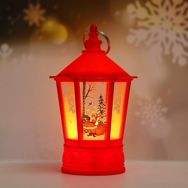 عيد الميلاد وميض شمعة فانوس ، هدايا عيد الميلاد ديكور المنزل ، مضاءة ثلج سانتا كلوز الرنة لحفل الزفاف في الهواء الطلق الجدول ديكور