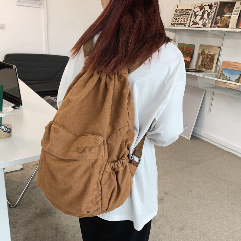 فتاة بلون الرجعية نمط قماش الكورية حقيبة ظهر نسائية غير رسمية Harajuku طلاب المدارس الثانوية غسلها قماش الرباط على ظهره