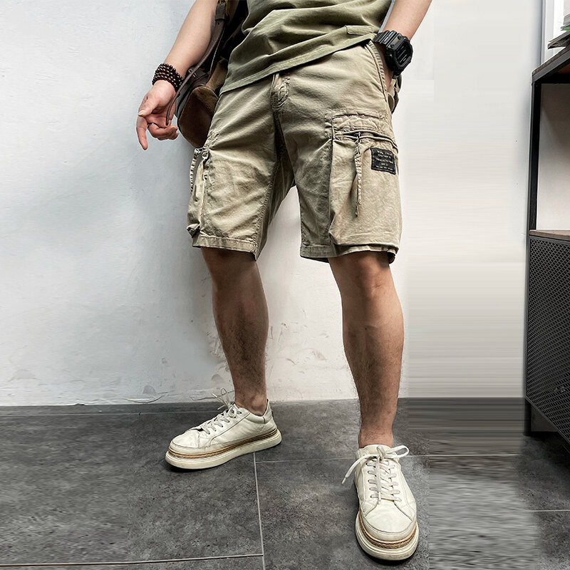 الرجال 2022 الصيف العلامة التجارية الجديدة عادية Pockets جيوب الكلاسيكية التمويه البضائع السراويل الرجال أبلى موضة حك القطن السراويل الرجال