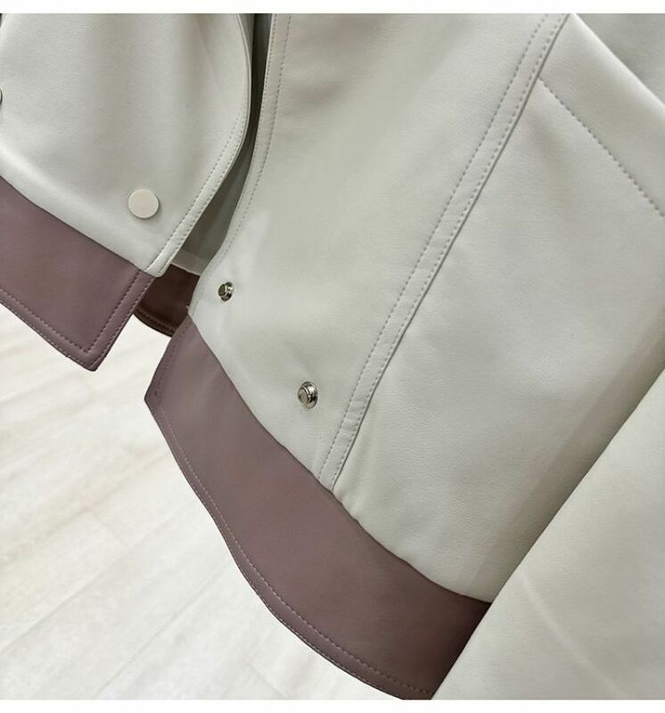 الرجعية المتناقضة اللون قصيرة بولي Leather سترة جلدية للنساء ربيع الخريف 2023 جديد شيك فضفاض Westernized سيارة معطف غير رسمي