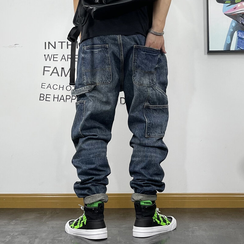 سراويل جينز عصرية أمريكية على طراز الهيب هوب وهي سراويل غير رسمية للرجال مصنوعة من قماش الدنيم بناطيل غير رسمية للرجال طراز هاراجوكو اليابانية