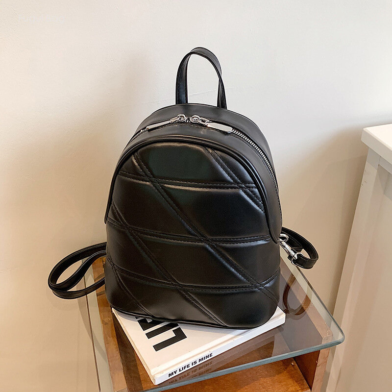 حقيبة ظهر نسائية كاجوال متعددة الاستخدامات ، حقيبة سفر جلدية بسيطة ، شبكة ماسية ، أحادية اللون ، طالب للتنقل ، اتجاه جديد ، موضة
