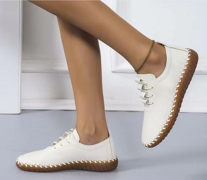 الشقق الجلدية مع منصة للنساء ، أحذية واحدة عادية ، أحذية الدانتيل متابعة كبيرة ، أبيض وأسود ، الاتجاه الجديد ، الربيع