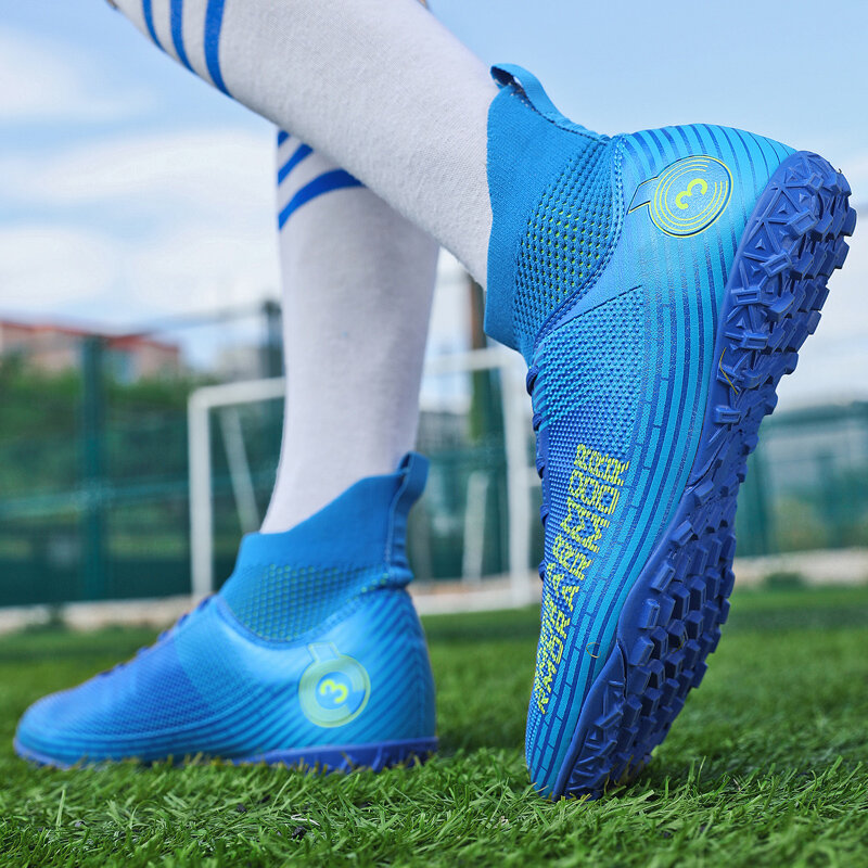 أحذية كرة قدم خارجية عالية الجودة للبيع بالجملة أحذية كرة قدم متينة للتدريب على كرة القدم خماسيات كرة قدم أحذية رياضية للجنسين من Futebol Chuteira De Campo