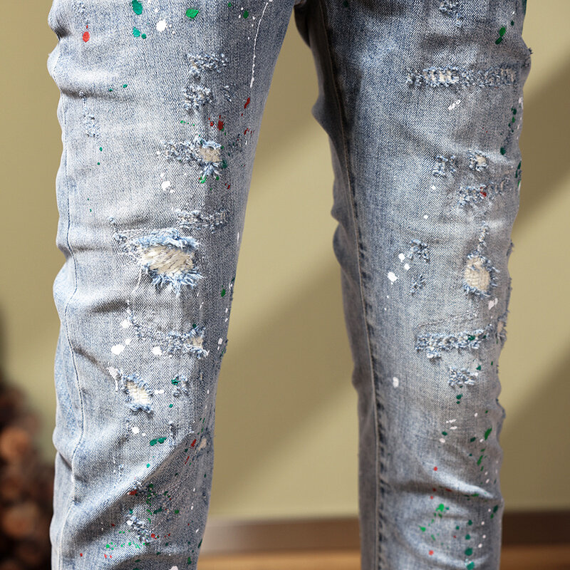 بنطلون جينز للرجال بتصميم عتيق أزرق فاتح ومطاط مرن وسميك مناسب وممزق من الجينز بتصميم هيب هوب للرجال