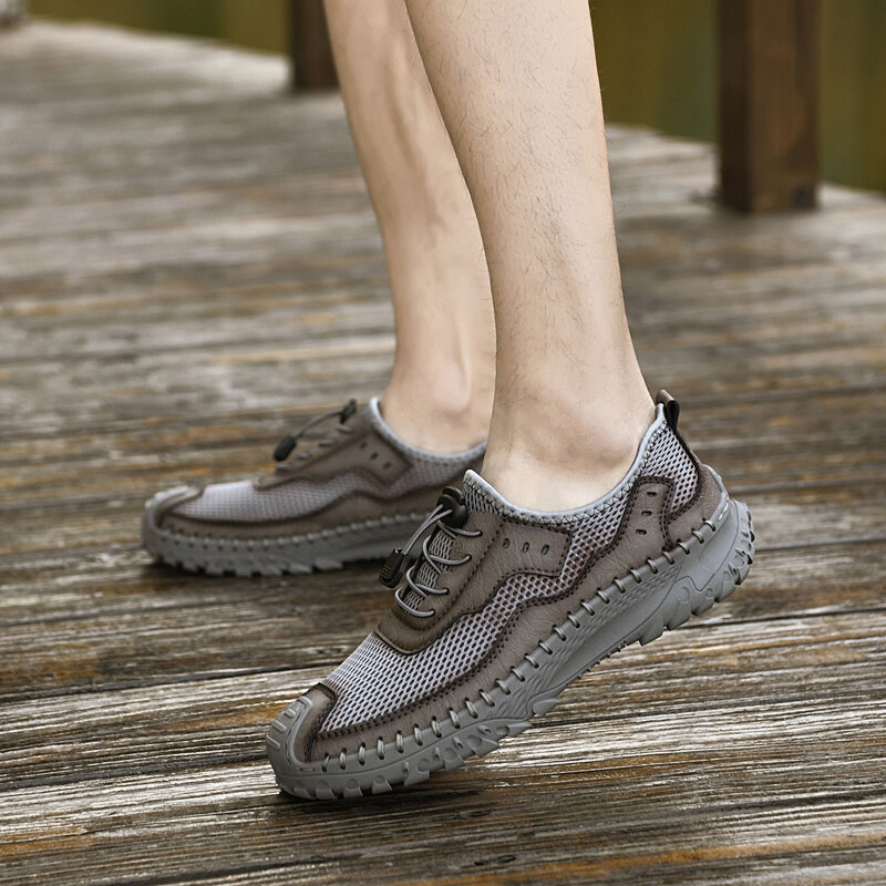 أحذية رجالية للمشي في الهواء الطلق 2023 جديدة تنفس شبكة شريط مرن أحذية رياضية غير رسمية للرجال موضة أحذية الخوض جلد طبيعي