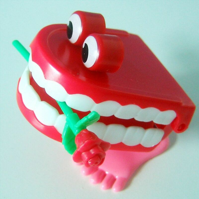 لعبة بلاستيكية على شكل أسنان للأطفال ، أسنان أطفال لطيفة ، لعبة الرياح ، وردة ، مشي