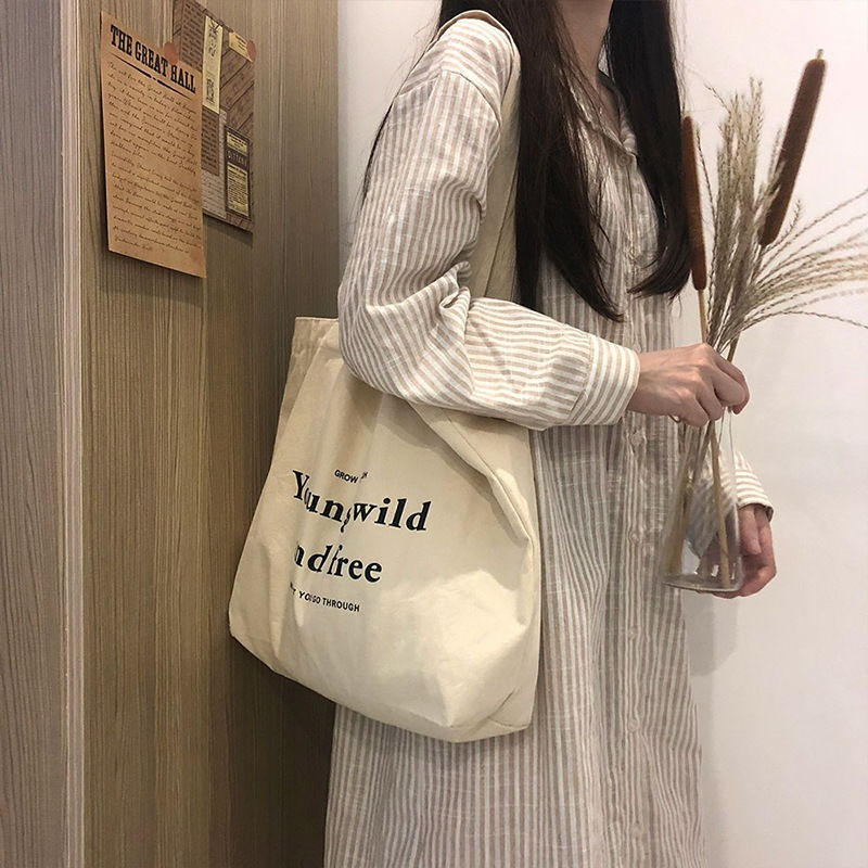 حقيبة نسائية رخيصة غير رسمية سعة كبيرة حقائب الكتف المتسوق قماش إلكتروني موضة Harajuku سستة طباعة Ulzzang حقائب اليد