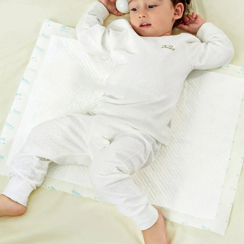 وسادات سرير يمكن التخلص منها للطفل ، طاولة تغيير الحفاضات ، وسادة بول ، وسادات تبول ، وامتصاص