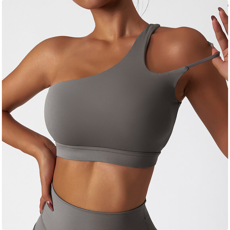 واحد الكتف للصدمات اليوغا الصدرية أنثى الجمال الظهر رياضة ممارسة ملابس داخلية رياضية غير النظامية الأشرطة تشغيل قميص لياقة بدنية أعلى