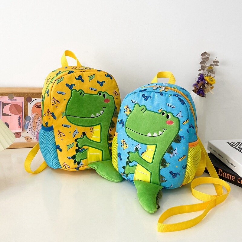 حقيبة مدرسية للبنات والأولاد مُزينة برسوم كارتونية لطيفة في رياض الأطفال من سن 1 إلى 3 إلى 5 سنوات مضادة للضياع حقيبة ظهر شهيرة للأطفال على شكل ديناصور هدية