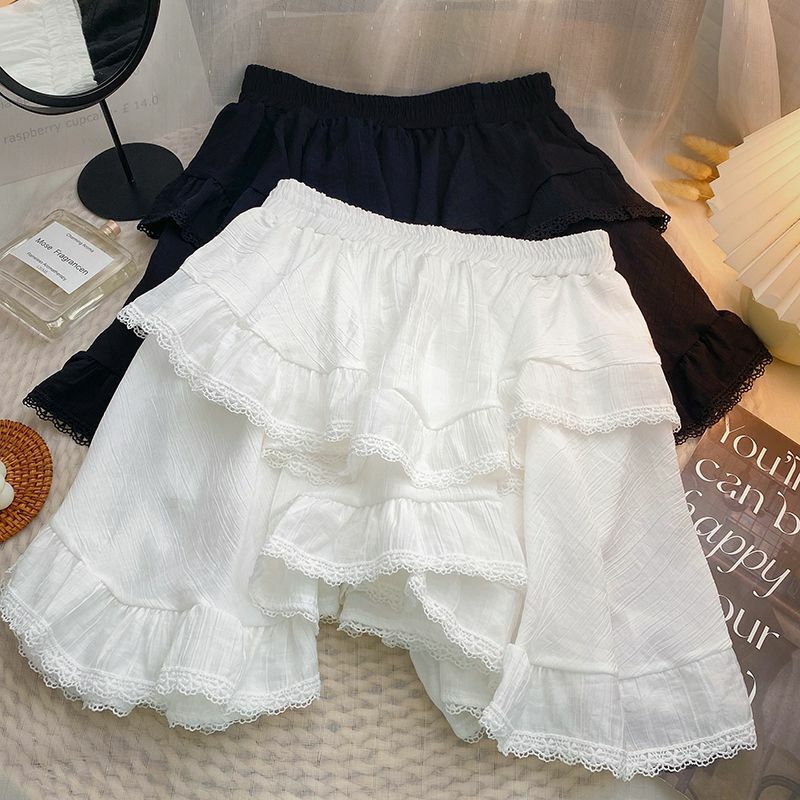 مرونة الخصر أبيض أسود غير النظامية تنورة صغيرة Kawaii النمط الياباني مدرسة Y2k الكشكشة الجمالية تنورة قصيرة النساء الشارع الشهير