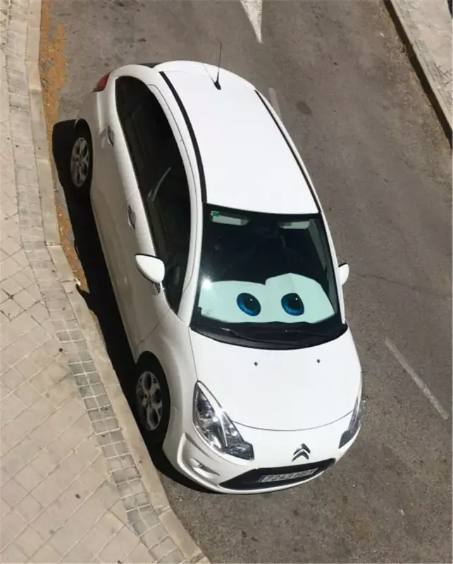 عيون كرتونية سوداء غطاء شمس زجاجي للسيارة واقي شمس للسيارة 130 × 70 سم