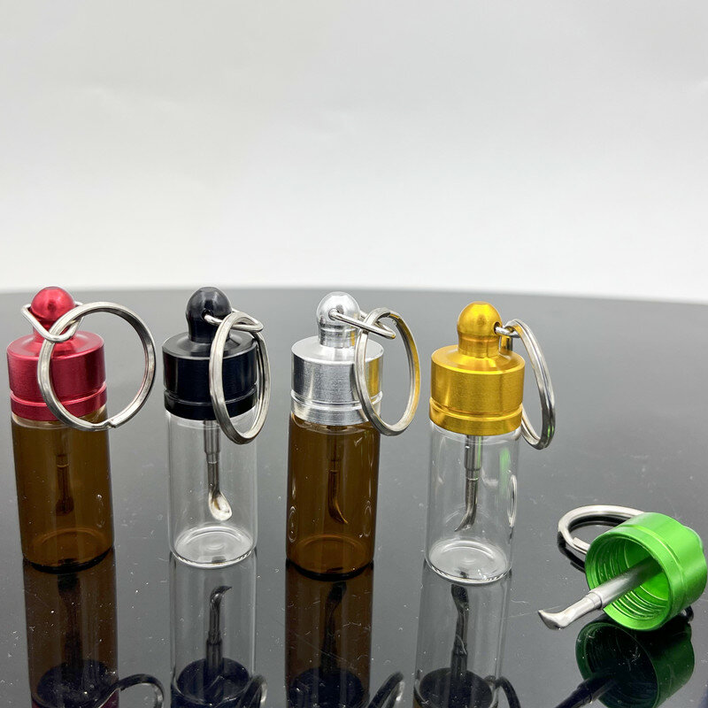 زجاج زجاجة خبأ جرة مطحنة مع ملعقة معدنية إكسسوارات كسارة التخزين مع سلسلة المفاتيح لون عشوائي