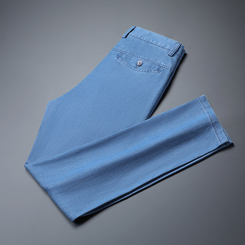 جديد لربيع وصيف 2023 بنطال جينز رجالي أزرق فاتح فضفاض قماش ليوسيل على الموضة مناسب للأعمال بنطال من قماش الدنيم المطاطي سراويل من علامة تجارية للرجال