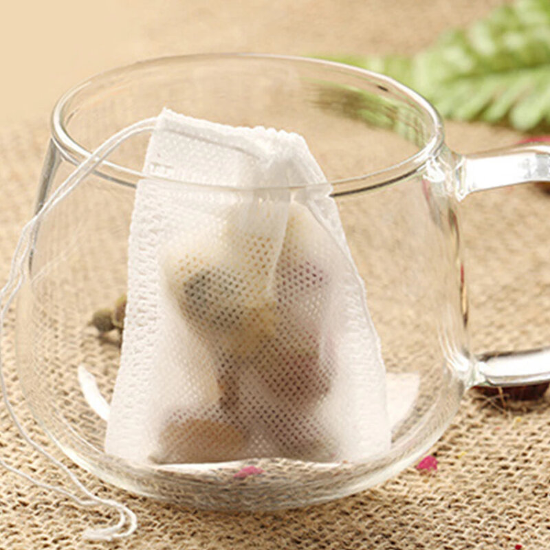 كيس الشاي مرشح 100 قطعة غير المنسوجة النسيج الشاي إينفوسير حقيبة عديم الرائحة متعددة الأغراض غرامة شبكة الشاي تصفية حقيبة مع تصميم الرباط ل