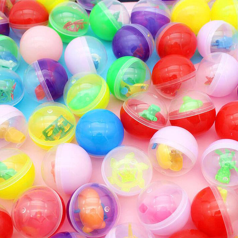 كبسولات كرة مفاجأة بلاستيكية ، لعبة مع ألعاب داخلية مختلفة الشكل ، 10 لكل عبوة