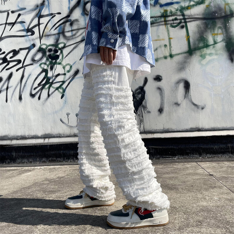 بنطلون جينز رجالي ممزق ثقيل صناعة هيب هوب أمريكي موضة 2023 ربيعي فضفاض مستقيم بتصميم فيبي سروال أبيض واسع