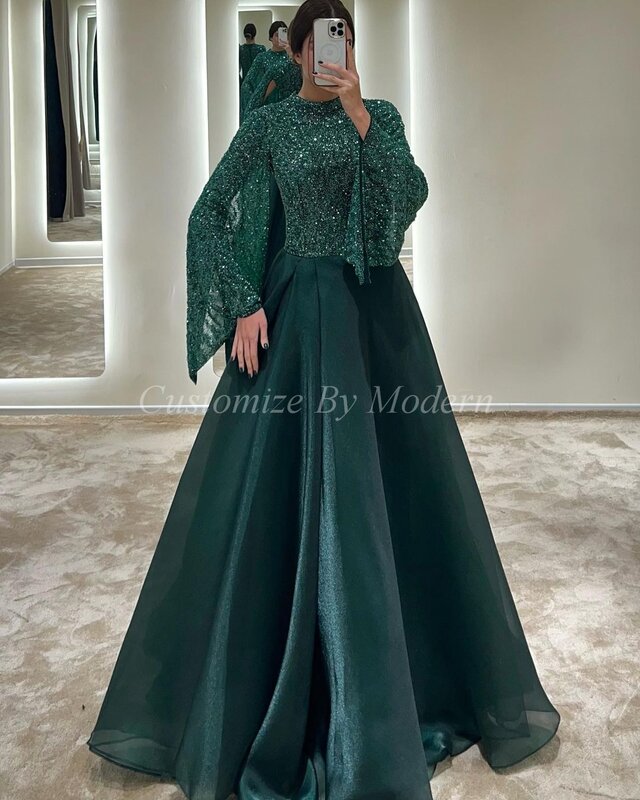 فستان رسمي للحفلات الراقصة بأكمام طويلة مزين بالترتر باللون الأخضر ورقبة على شكل حرف o
