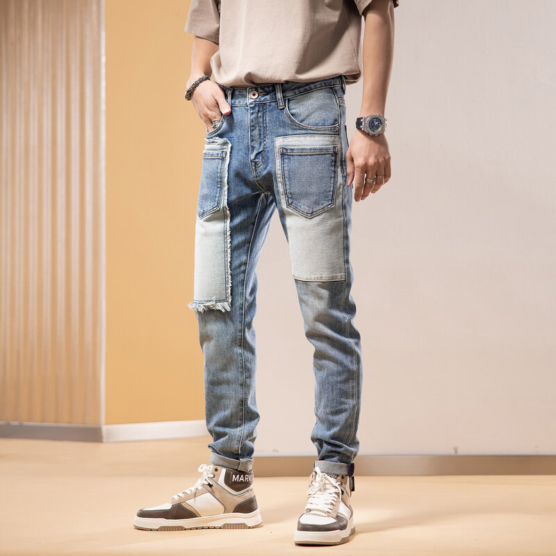 بنطلون جينز رجالي مطاطي أزرق بتصميم عتيق من Street Fashion بنطال جينز للرجال مُمزق مرقع ضيق مرن نمط الهيب هوب