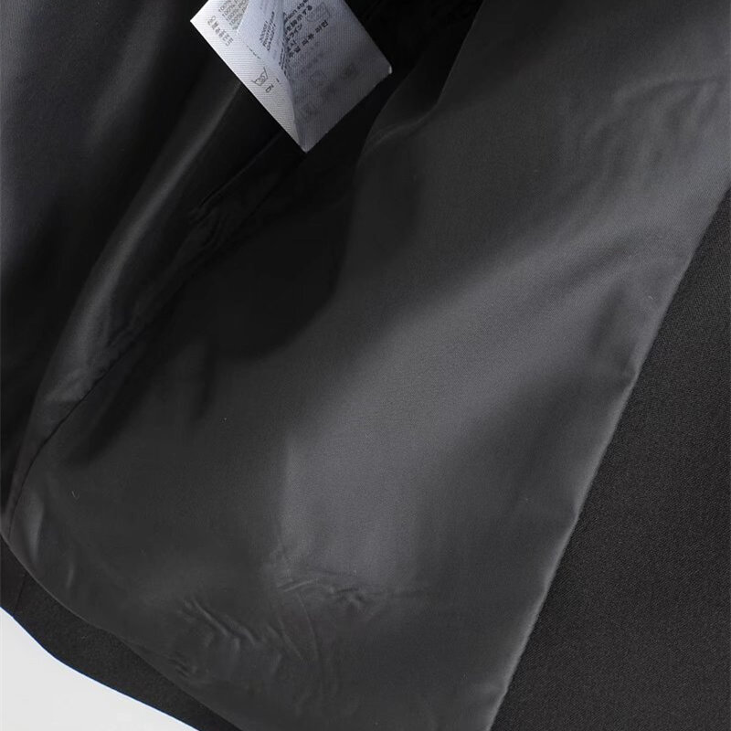 KEYANKETIAN جديد عودة الشق تصميم غير متناظرة سليم الأسود البدلة الصدرية موضة منتصف طول المرأة سترة بلا أكمام معطف