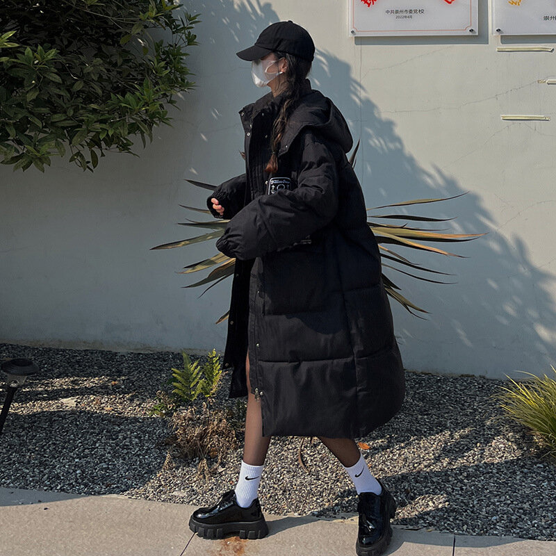 2023 الشتاء المرأة الموضة تنوعا بسيطة ودافئة منتصف طول أسفل القطن معطف المرأة الكورية فضفاض معطف القطن عادية معطف