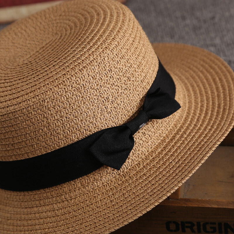 قبعات صيفية للنساء قبعة الشمس السيدات الشاطئ موضة شقة Brom Bowknot بنما سيدة عادية قبعات للحماية من الشمس للنساء القش قبعة