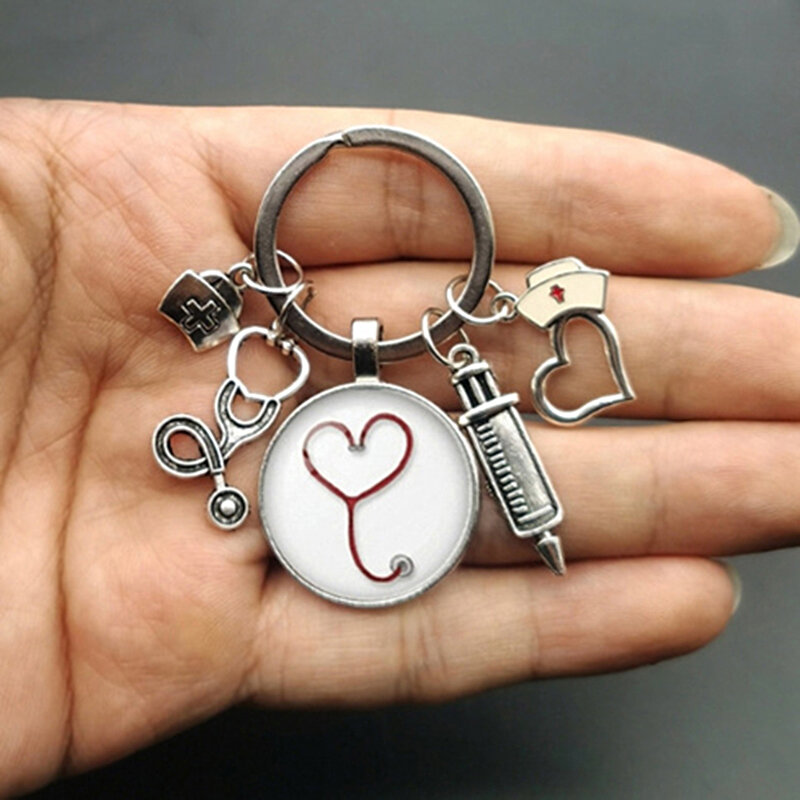 2022 تصميم جديد المفاتيح الطبيب أداة طبية السماعة حقنة قناع حلقة رئيسية ممرضة طالب الطبية هدية سلسلة مفاتيح تذكارية