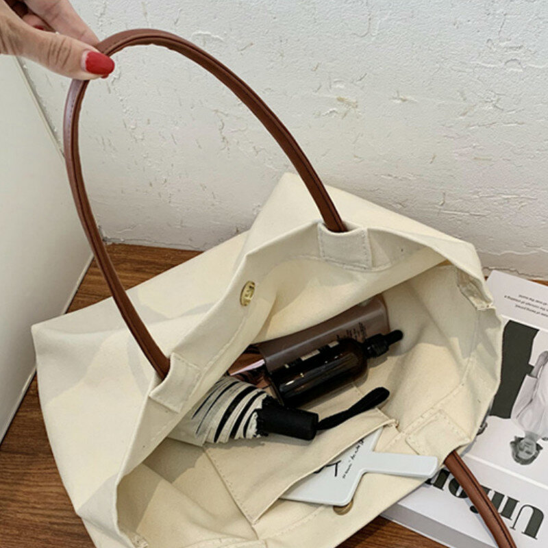 حقائب التسوق النساء الصلبة بسيطة حمل حقيبة سعة كبيرة قماش المتسوق الإناث Ins قابلة لإعادة الاستخدام الكورية نمط الموضة صديقة للبيئة.
