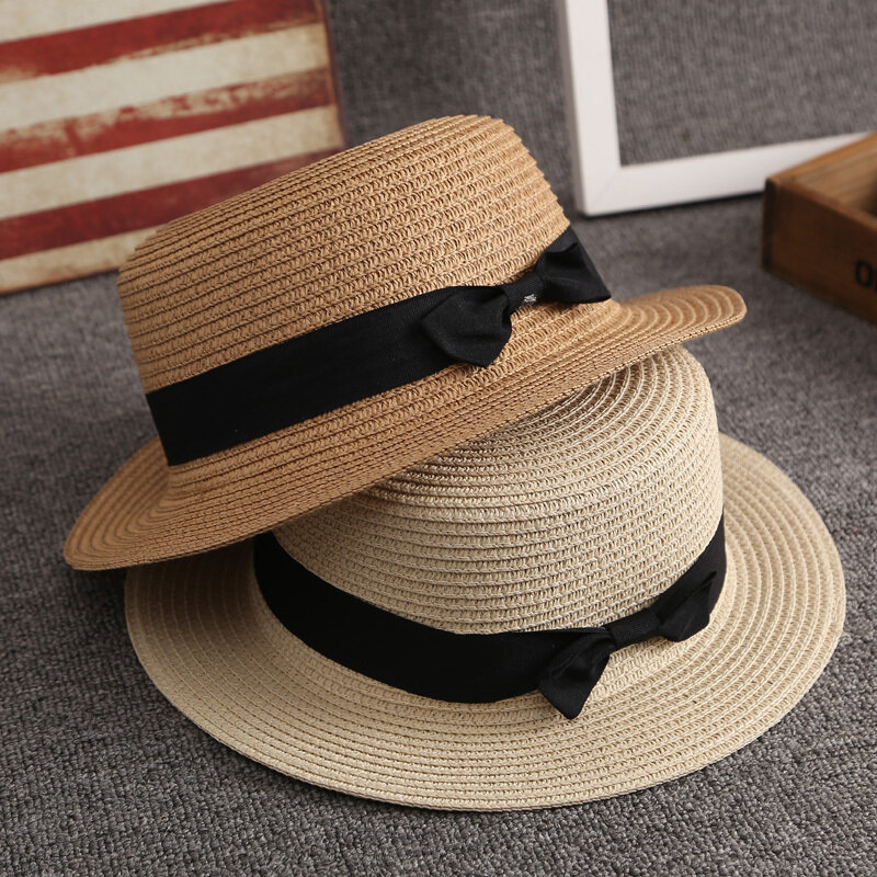 قبعات صيفية للنساء قبعة الشمس السيدات الشاطئ موضة شقة Brom Bowknot بنما سيدة عادية قبعات للحماية من الشمس للنساء القش قبعة