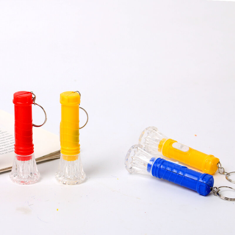 LED وامض شفافة مصباح يدوي صغير محمول مفتاح سلسلة رياض الأطفال مضيئة لعب ألعاب صغيرة جوائز بالجملة