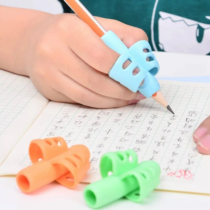 100 قطعة ثلاثة إصبع قلم من السيليكون حامل الكتابة الإيدز المبتدئين الكتابة مستلزمات الأطفال الإبهام الموقف تصحيح