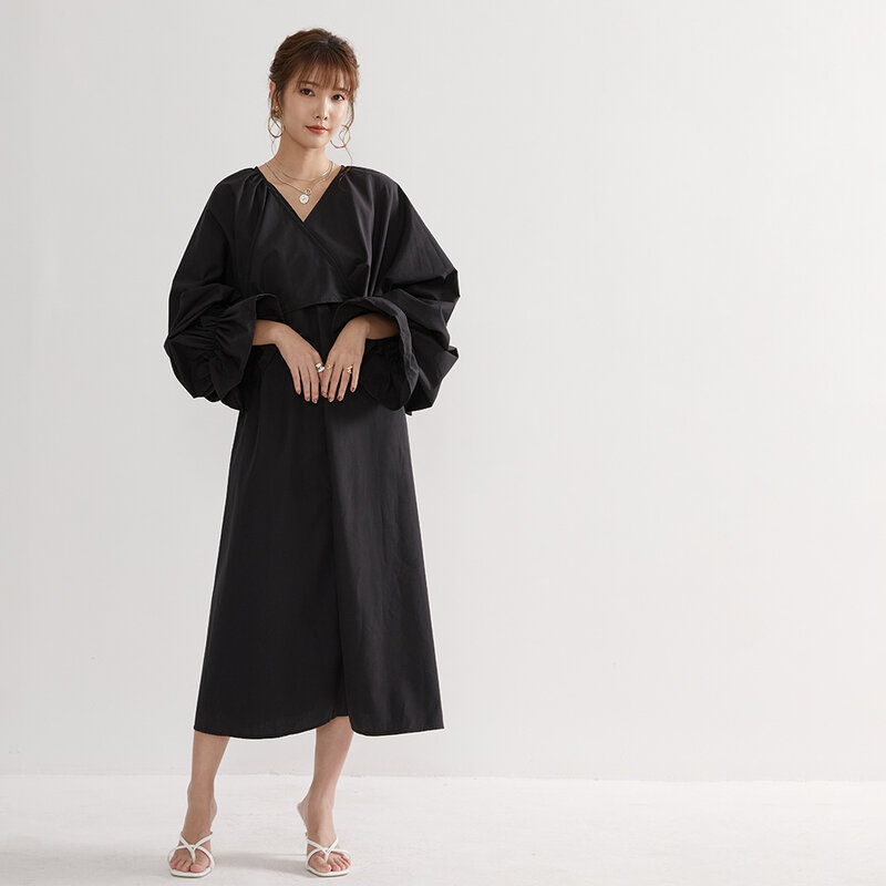فستان أسود عتيق غير رسمي فضفاض تنورة متوسطة الطول بسيطة بلون ياباني للشاطئ تنورة شمس مزيفة موضة صيف 2021 جديد