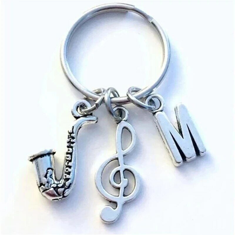 شخصية الساكسفون المفاتيح الساكسفون مفتاح سلسلة هدية لموسيقي الجاز كيرينغ Sax الحاضر ثلاثة أضعاف المفتاح الموسيقي الأولي السحر