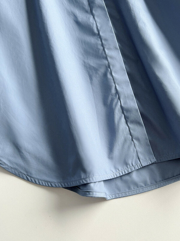 بلوزة نسائية مطرزة باللون الأزرق بتصميم ظلية موضة ربيع 2022 قميص نسائي جديد بياقة مقلوبة أزرار مغطاة فضفاضة بسيطة