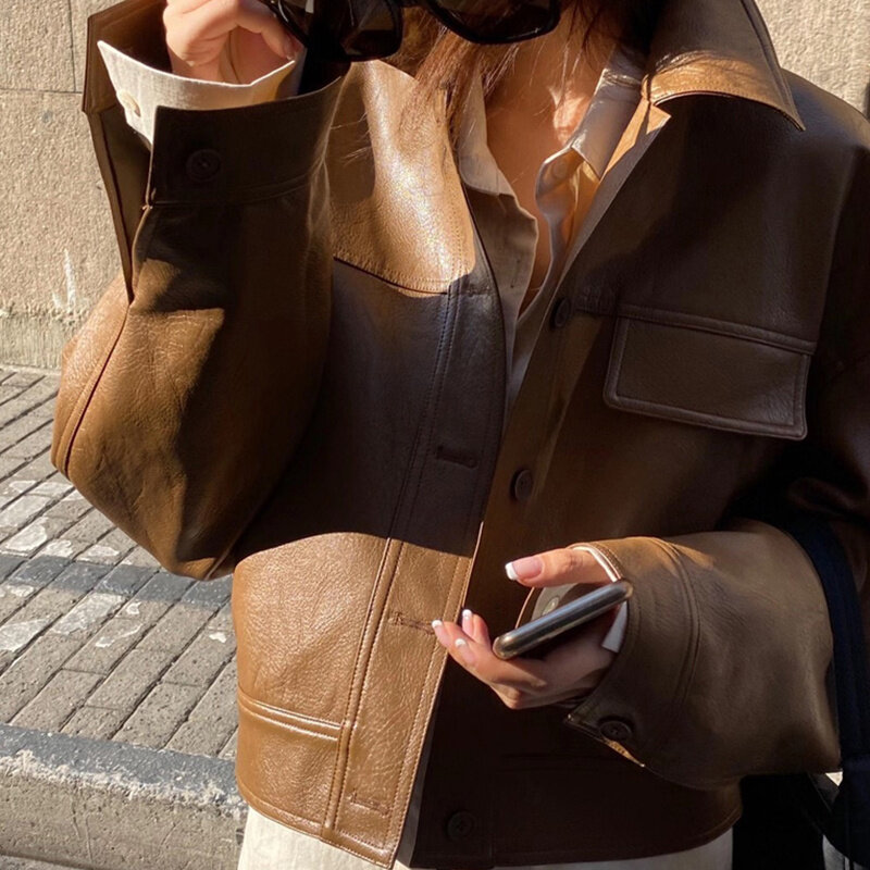 جيب فو بولي Leather جلدية ملابس خارجية جاكيتات المرأة الجديدة الكورية بدوره أسفل طوق المد فضفاضة الشارع ملابس خارجية الإناث